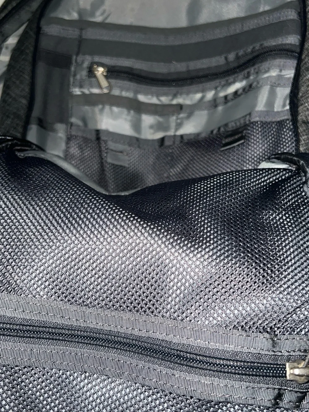 The North Face Black Backpack with Light Gray-Green Accents